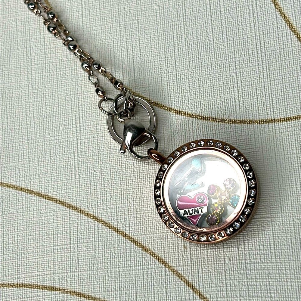 Locket with charms necklace.